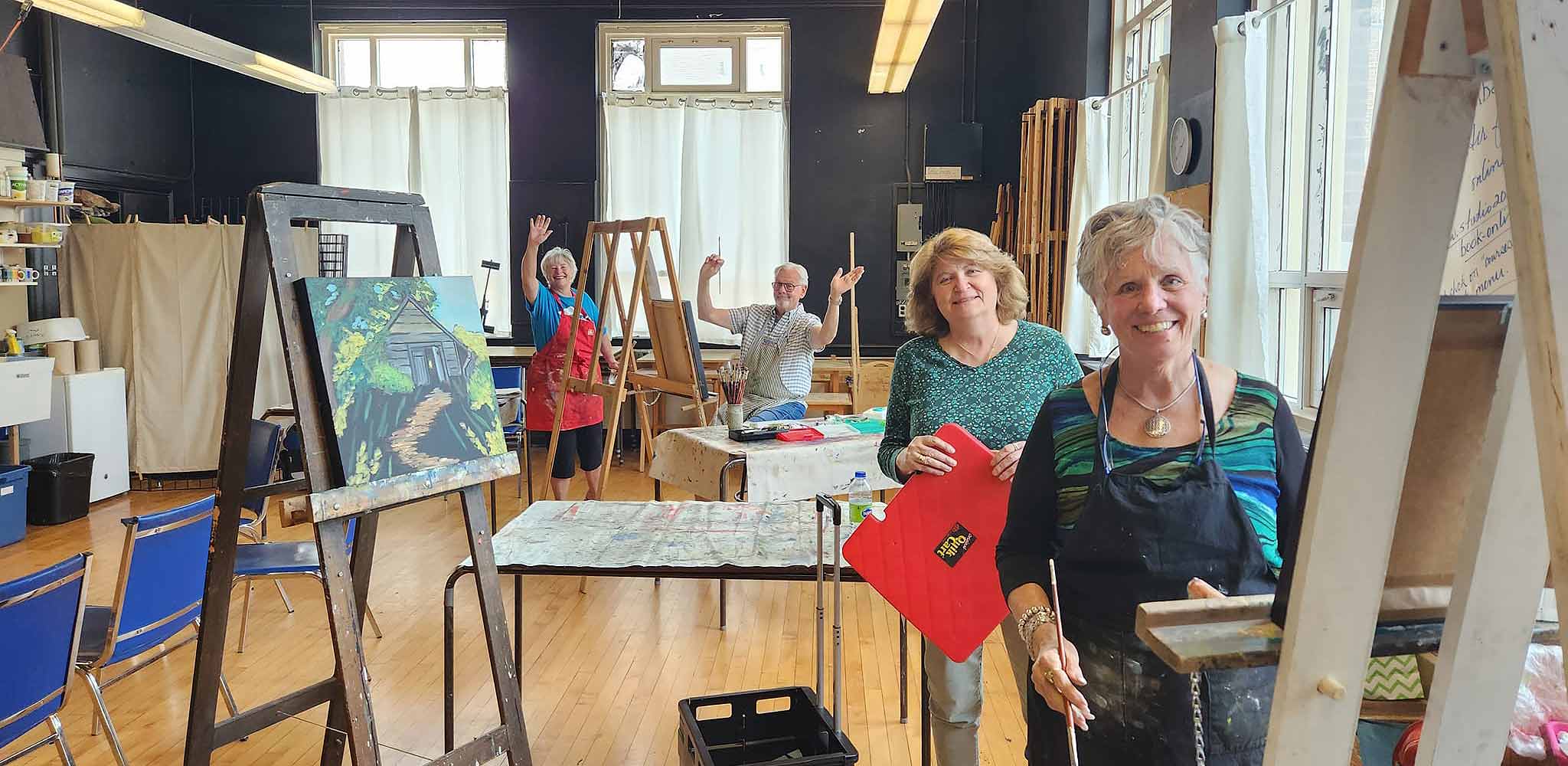Studio 201 Artist Collective; a welcoming studio space featuring big windows for natural light, tall ceilings and hardwood floors.